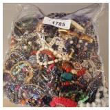 BAG OF ASSORTED COSTUME JEWELRY