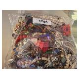 BAG OF ASSORTED COSTUME JEWELRY