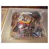 BAG OF ASSORTED COSTUME JEWELRY