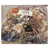 BAG OF ASSORTED COSTUME JEWELRY