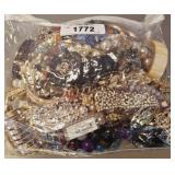 BAG OF ASSORTED COSTUME JEWELRY
