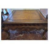 ORNATELY CARVED BALL/CLAW COCKTAIL TABLE