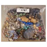 BAG OF ASSORTED COSTUME JEWELRY