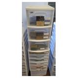 STACK OF STORAGE BINS, FABRIC SAMPLES