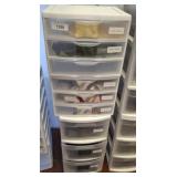 STACK OF STORAGE BINS, FABRIC SAMPLES