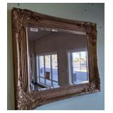 BEVELED MIRROR IN ORNATE FRAME