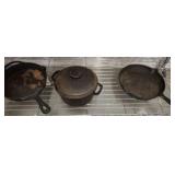 GROUP OF CAST IRON PANS AND SMALL DUTCH OVEN