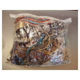 BAG OF ASSORTED COSTUME JEWELRY