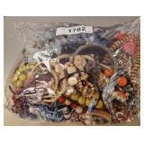 BAG OF ASSORTED COSTUME JEWELRY