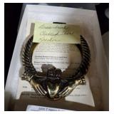 BRASS IRISH CLADDED DOOR KNOCKER AND FLATWARE
