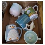 BASKET OF COLLECTOR MUGS