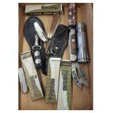 FOLDING KNIVES AND FLASH LIGHTS