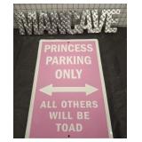 MANCAVE AND PRINCESS PARKING SIGN