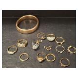 GOLD TONE RINGS AND BRACELET