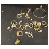 GOLD TONE RINGS AND BRACELET