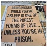 BEING KISSED SIGN