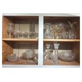 CONTENTS OF CABINET OVER FRIDGE