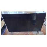 VIZIO 40 IN TV ON STAND W/ REMOTE