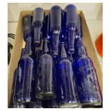 TRAY OF BLUE BOTTLES