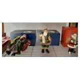 GROUP OF SANTA FIGURINES
