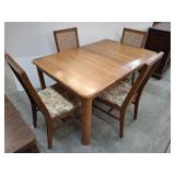 OAK TONE DINING TABLE AND 4 CANE BACK CHAIRS