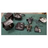 ASSORTED VINTAGE POLAROID CAMERAS AND ACCESSORIES