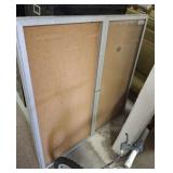 BULLETIN BOARD, MISSING GLASS