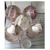 ASSORTED TEA CUPS AND SAUCERS