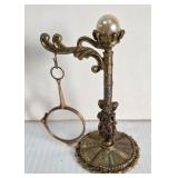 VICTORIAN CHERUB MAGNIFYING GLASS AND STAND