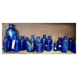 ASSORTED COBALT MEDICINE BOTTLES
