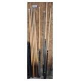 GROUP OF POOL CUE STICKS