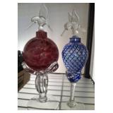HUMMING BIRD STOPPERS IN DECORATIVE BOTTLES