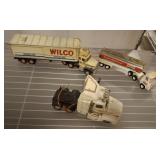WILCO TRUCK, EXXON TANKER, AND TRUCK