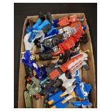 TRANSFORMING TOYS AND TRANSFORMERS