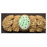 HAND CARVED JADEITE PIN WITH ORNATE GILT BRASS