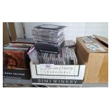 CDS, DVDS, AND VINTAGE DISNEY VHS TAPES