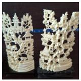 CARVED BONE 2PC FIGURINES ON WOODEN STAND