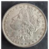 1885-O MORGAN SILVER DOLLAR