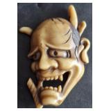 NETSUKE CARVED DEMONIC CHARM