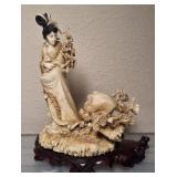 ORIENTAL CARVED FEMALE FIGURE WITH WOODEN STAND