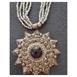 UNMARKED SILVER TONE PENDANT AND NECKLACE