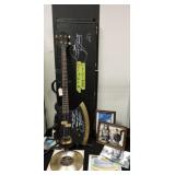 GENE SIMMONS STAGE PLAYED, BLOOD COVERED GUITAR