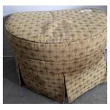 UPHOLSTERED OTTOMAN ON CASTERS