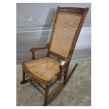 ANTIQUE CANE BOTTOM AND BACK ROCKING CHAIR