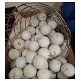 ASSORTED GOLF BALLS AND RANGE BUCKET