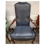 LEATHER TYPE ARMCHAIR W/ NAIL HEAD TRIM
