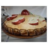 COVER PLATE SHAPED LIKE PIE SHOWS CRACK ON LID