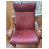 IKEA Model Chair with Red Upholstery and Wooden Fr