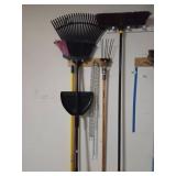Garden Tools Including Rakes, Shovel, and Chains