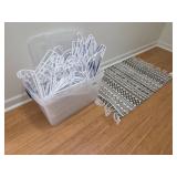 Plastic Storage Bin with White Hangers and Geom